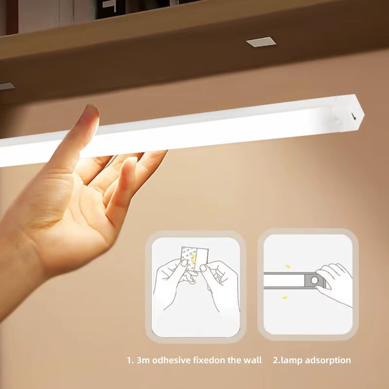 Hand waving in front of a motion sensor LED light inside a wardrobe, demonstrating touchless activation