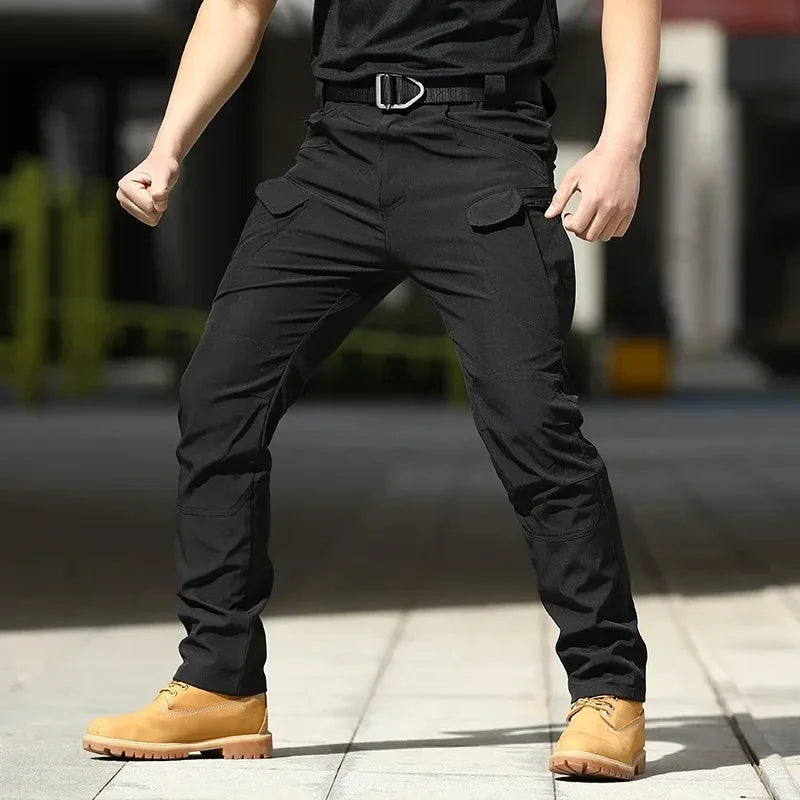 Men's slim fit cargo trousers side view – elastic waistband and cargo pocket detail