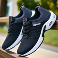 Men's black air cushion knit sneakers – front angle view, lightweight breathable design