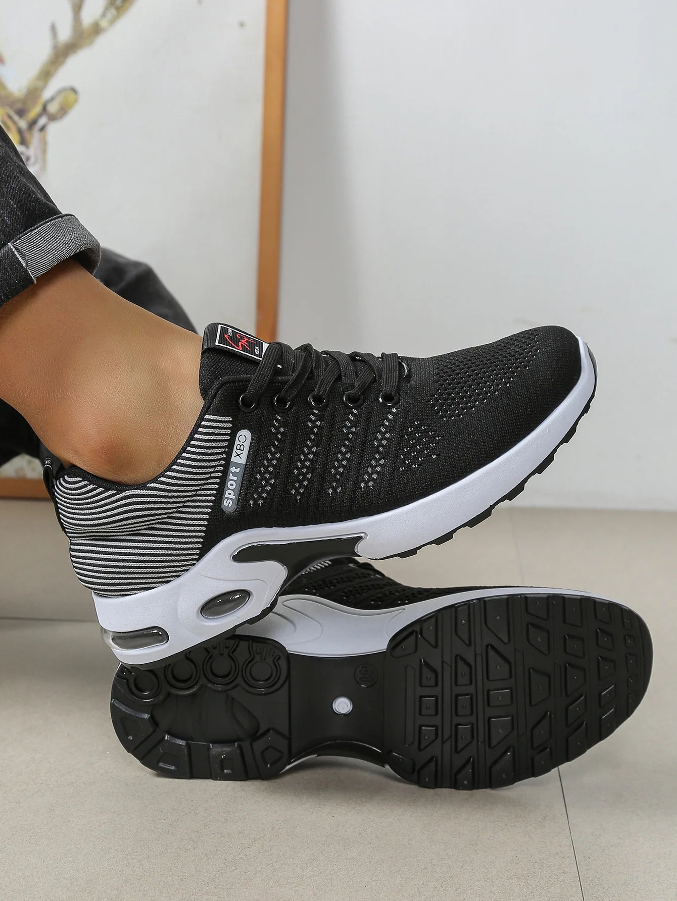 Men's knit sneakers bottom view – non-slip rubber outsole detail